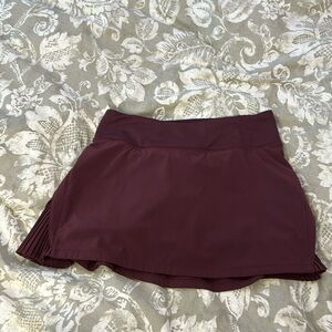 NWOT LULULEMON SKORT SIZE 2. PURPLE PLUM COLOR.